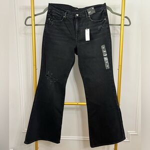 NWT Mid Rise Washed Black Ripped 70s Flare Jeans